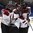 SPISSKA NOVA VES, SLOVAKIA - APRIL 21: Latvia's Verners Egle #9 celebrates with Andrejs Kostjuks #8, Daniels Berzins #12, Regnars Udris #6 and Viktors Jasunovs #22 after a third period goal against Belarus during relegation round action at the  2017 IIHF Ice Hockey U18 World Championship. (Photo by Andrea Cardin/HHOF-IIHF Images)

